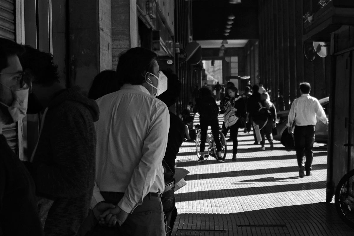 South Africans queuing outside an office building